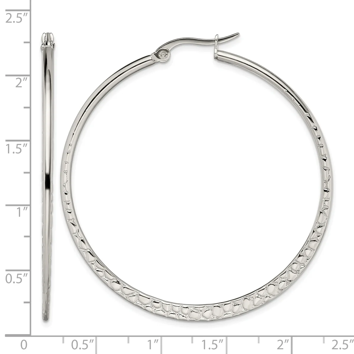 Silver-tone hoop earrings with textured surface, shown front and side view against a ruler measuring approximately 2.25 inches in diameter.