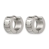 A pair of polished silver-tone huggie hoop earrings with textured sides and hinged closures, shown from the front.