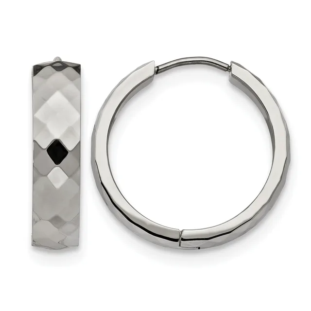 Pair of polished silver hoop earrings with faceted black and white diamond-shaped inlay pattern, shown from front and side views.