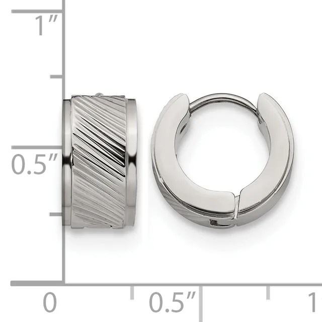 A pair of stainless steel huggie hoop earrings with diagonal textured finish on one earring and polished surface on the other, shown next to a ruler indicating approximately half-inch diameter.