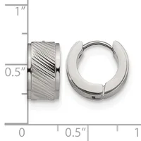 A pair of stainless steel huggie hoop earrings with diagonal textured finish on one earring and polished surface on the other, shown next to a ruler indicating approximately half-inch diameter.