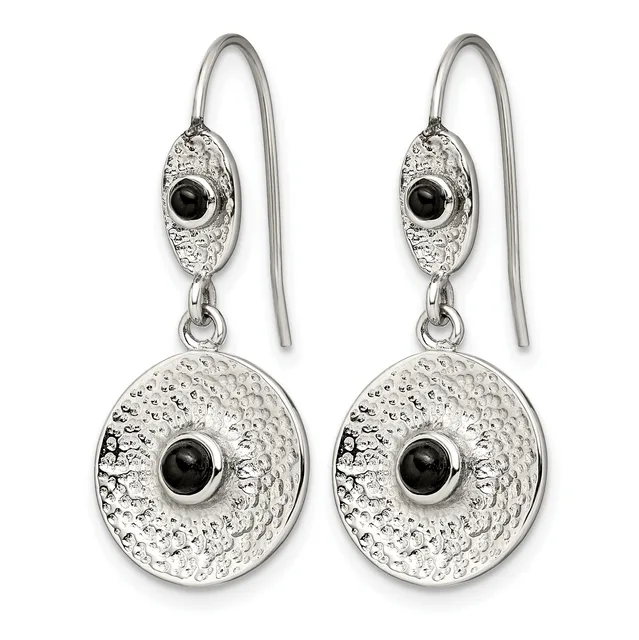 Pair of silver drop earrings with textured oval and circular disc elements, each centered with a black onyx stone, suspended from wire hooks.