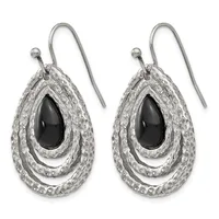 A pair of silver teardrop earrings with textured outer layers surrounding black onyx centers, displayed against a white background.