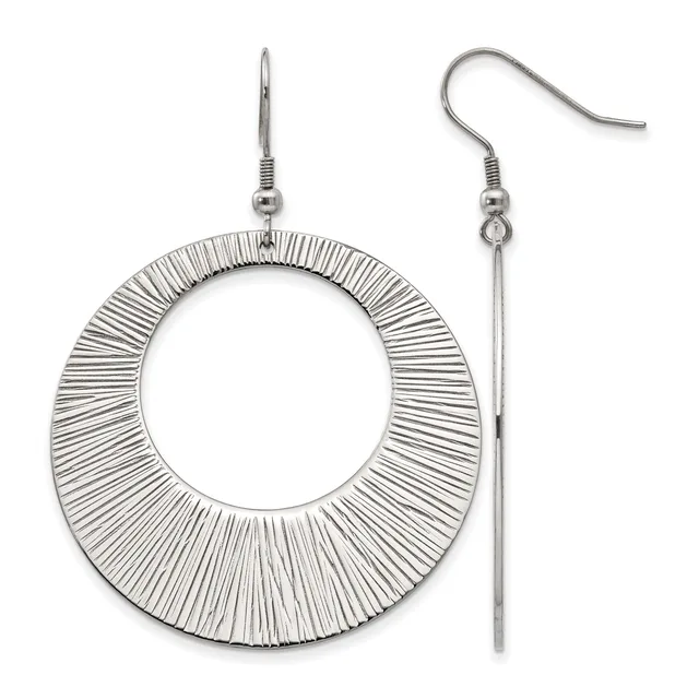 A pair of silver-toned dangle earrings with textured circular rings and matching fish hook ear wires.