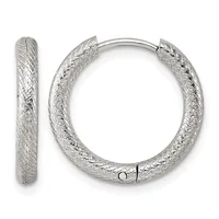 A pair of textured silver hoop earrings with a crosshatch pattern, shown from the front and side view with a small hallmark visible on the clasp.