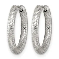 A pair of silver hoop earrings with a textured crosshatch surface pattern and hinged closures, shown from the front.