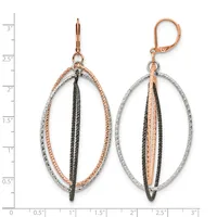 A pair of oval dangle earrings with rose gold and silver textured outer rings and black and rose gold striped inner chains, displayed against a measurement scale.
