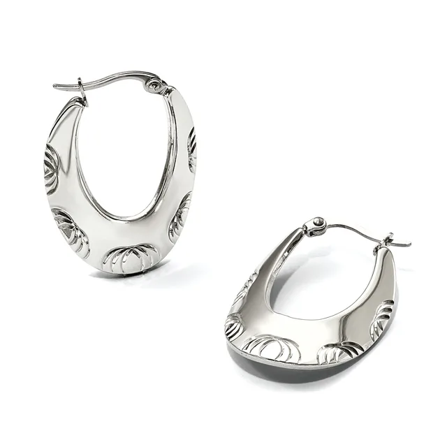 Two silver hoop earrings with textured oval shapes and decorative striped patterns on the sides, shown from front and back angles.
