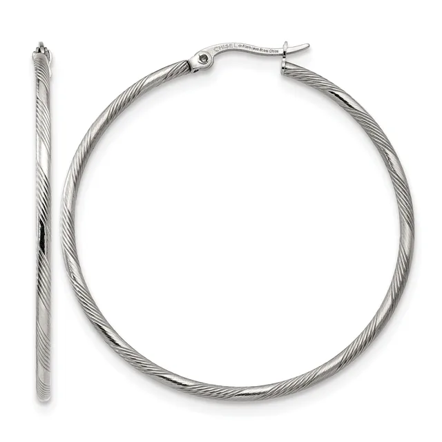 A pair of silver-toned twisted hoop earrings displayed open and closed views against a white background.
