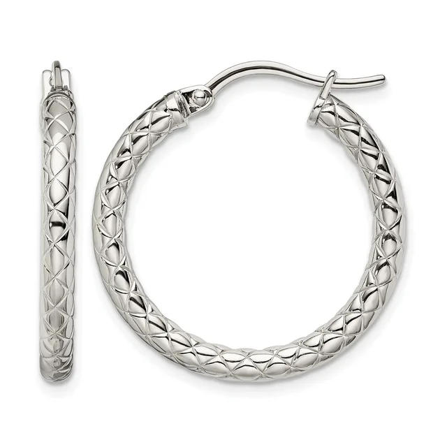 A pair of silver hoop earrings with a quilted crosshatch surface pattern, shown from front and side views.