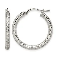 A pair of silver hoop earrings with a quilted crosshatch surface pattern, shown from front and side views.