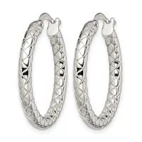 A pair of silver hoop earrings with a textured crosshatch pattern and curved hook closures, displayed against a white background.