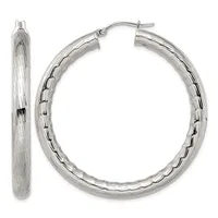 A pair of silver hoop earrings with a textured surface pattern, shown from front and side views.