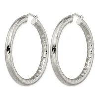 Pair of silver-toned hoop earrings with a textured hammered finish and hinged closure posts, shown from the front.
