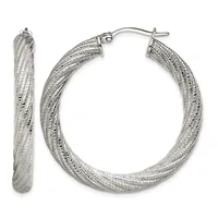 A pair of silver textured hoop earrings shown from the front and side, featuring a brushed surface pattern and post-and-clutch closures.