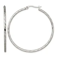 A pair of silver twisted hoop earrings with hinged posts, shown from front and side views.