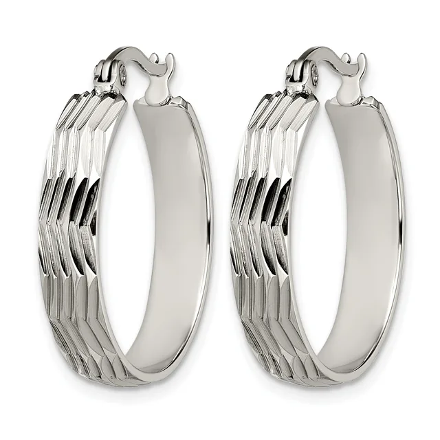 Pair of silver-toned hoop earrings with ridged texture on the outer surface and smooth polished finish on the inner curved edge, shown from the front.