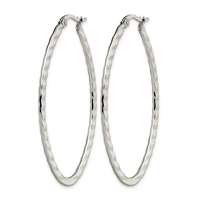 A pair of polished silver-toned oval hoop earrings with a twisted surface texture and hinged posts displayed against a white background.