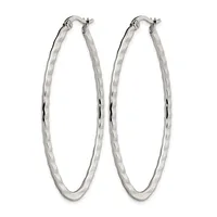 A pair of polished silver-toned oval hoop earrings with a twisted surface texture and hinged posts displayed against a white background.