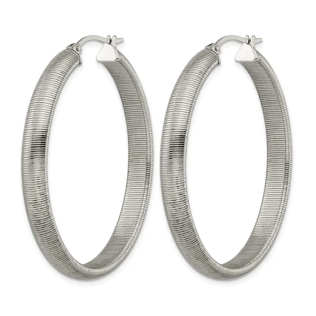A pair of silver-toned textured hoop earrings with a coiled or ribbed surface pattern, shown against a white background.