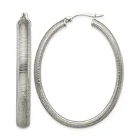 A pair of silver textured hoop earrings with a ribbed surface finish and hook closures, shown from front and side views.
