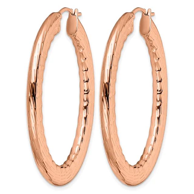 A pair of rose gold hoop earrings with a textured finish and small hallmark, shown from the front against a white background.