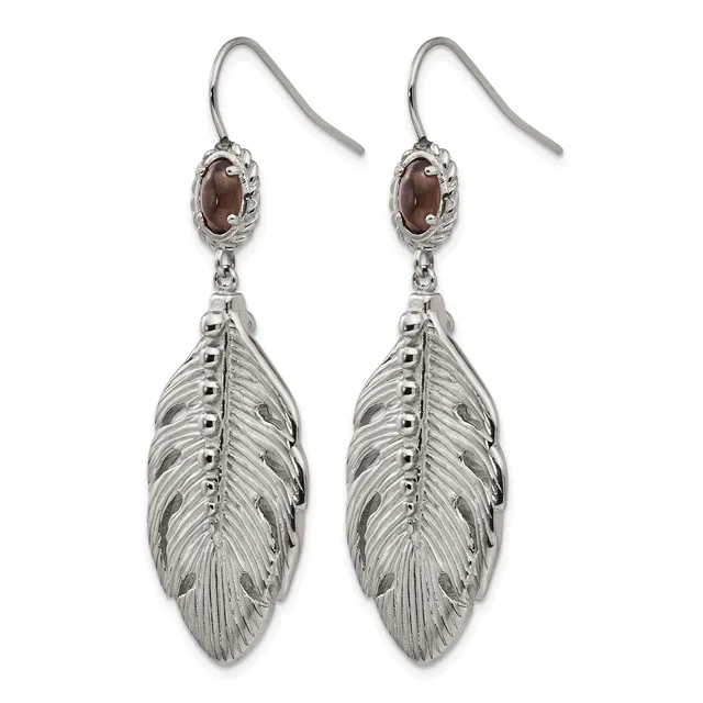Pair of silver feather drop earrings with garnet cabochon studs and French wire hooks.