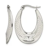 A pair of silver hoop earrings with textured surfaces and polished smooth edges, displayed from front and side angles.