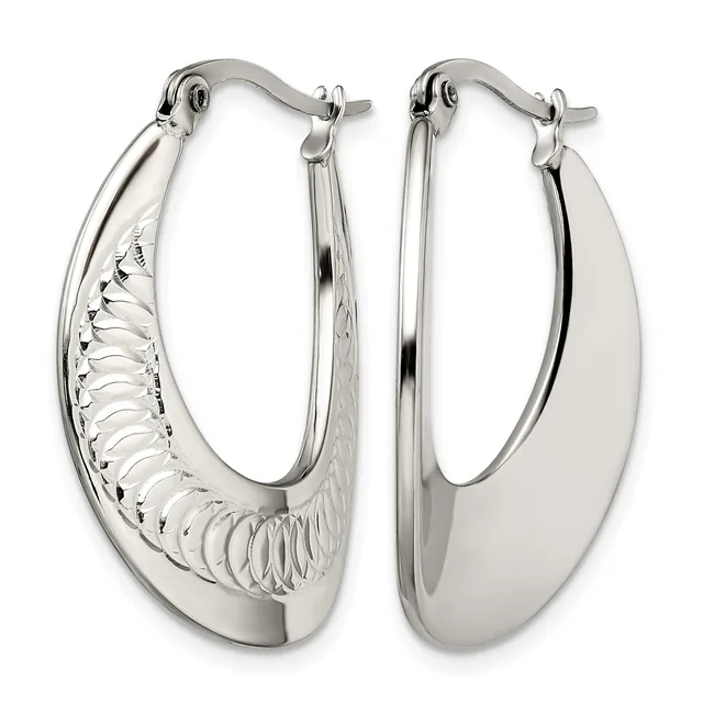 Pair of silver-toned oval hoop earrings with textured inner surfaces and polished outer surfaces, displayed front and back views.