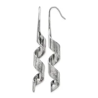 A pair of long silver earrings with twisted ribbon-like designs and polished sections, suspended from curved ear wires.