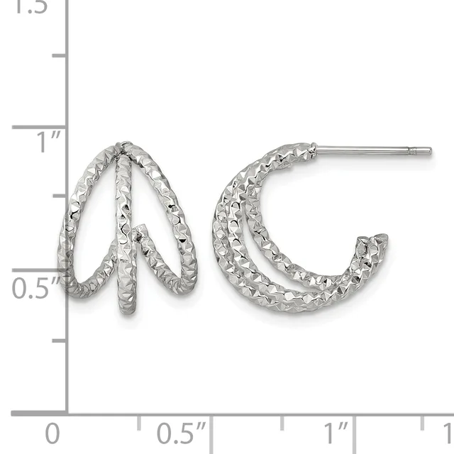 Pair of textured silver curved hoop earrings with post backs, displayed against a measurement scale showing approximately one inch in length.