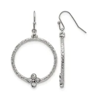 Pair of silver textured oval hoop earrings with cubic zirconia accents at the bottom, shown with fish hook closures.