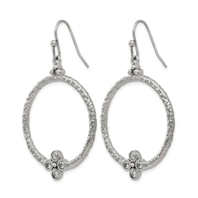 Pair of silver-tone oval drop earrings with textured borders and small cross-shaped crystal embellishments at the bottom, suspended from fish-hook wires.