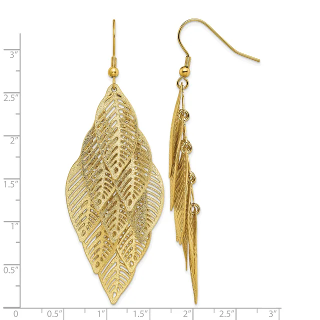 Gold-toned filigree leaf-shaped dangle earrings with French hook closures, shown front and side view against a measurement scale.