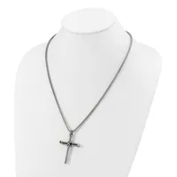 Silver-toned chain necklace with a cross pendant displayed on a white mannequin bust.