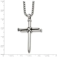 Stainless steel cross pendant with wrapped detail at center, hanging from a curb chain, shown against a measurement scale.