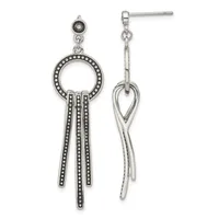 Pair of silver-toned dangle earrings with dotted circle tops and three beaded fringe strands on the left, smooth twisted design on the right.