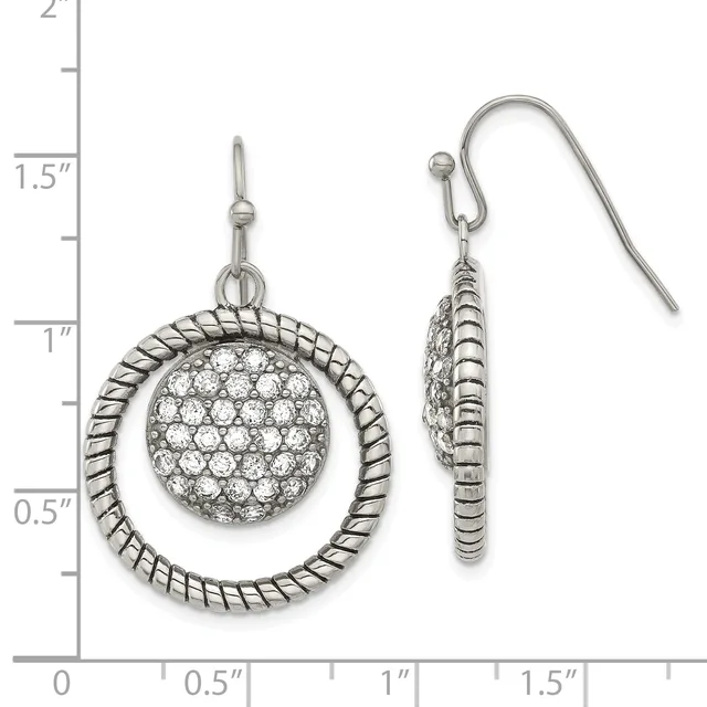 Silver-tone dangle earrings featuring a twisted rope circle outline with a crystal-paved sphere suspended inside, shown on a measurement scale.