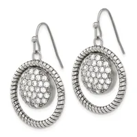 Pair of silver teardrop earrings with textured oval frames enclosing oval pavé crystal centers, suspended from hook wires.