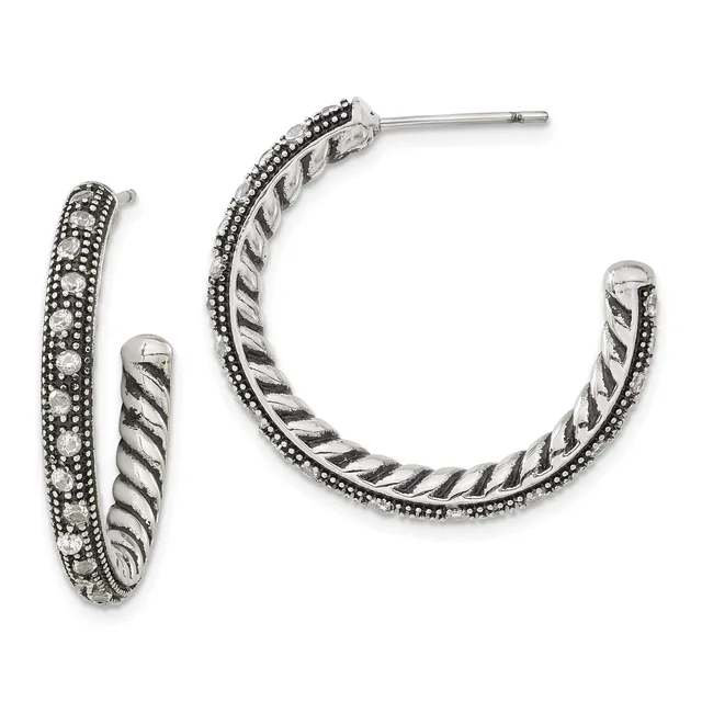Pair of silver hoop earrings with twisted rope texture inner band and beaded outer edge, shown from front and side views.