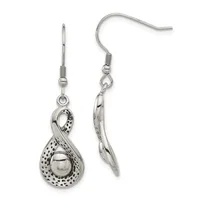 Pair of silver dangle earrings with textured teardrop-shaped pendants containing small pearl-like spheres, shown front and back views.