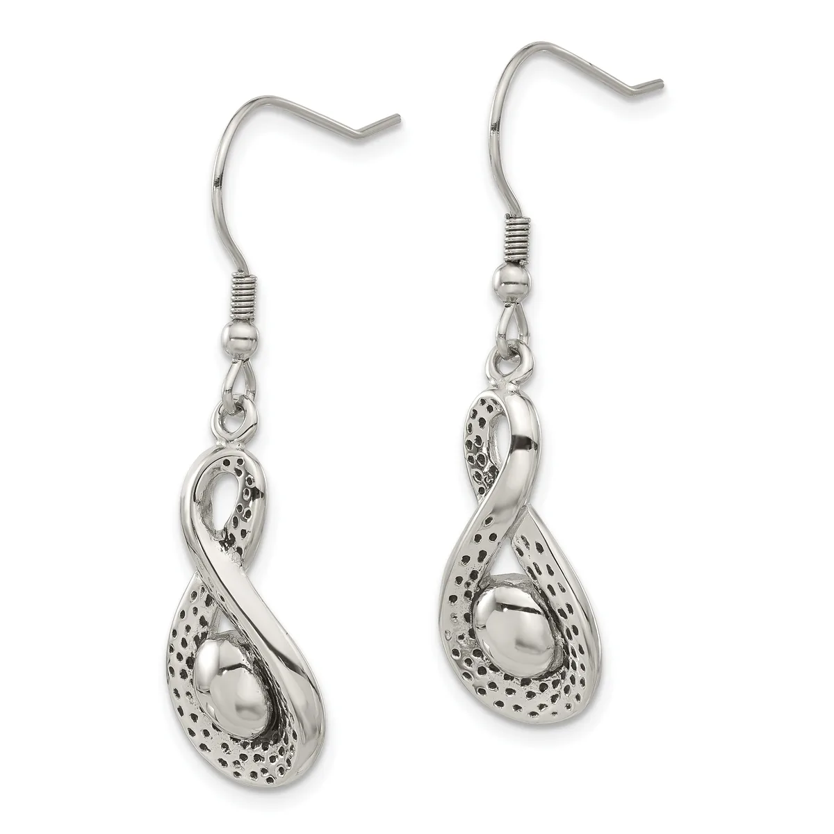 A pair of silver teardrop earrings with textured dot pattern detailing and smooth polished centers, suspended from silver fish hook wires.