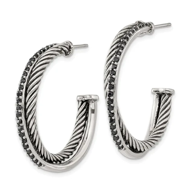 Pair of silver-toned hoop earrings with twisted rope texture and black gemstone accents along the outer edge, shown at different sizes.