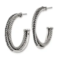 Pair of silver-toned hoop earrings with twisted rope texture and black gemstone accents along the outer edge, shown at different sizes.