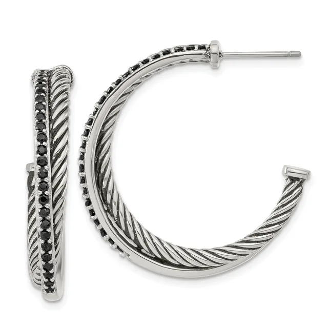 A pair of silver-toned hoop earrings with twisted rope texture and black gemstone accents along the outer edge, shown from front and side views.