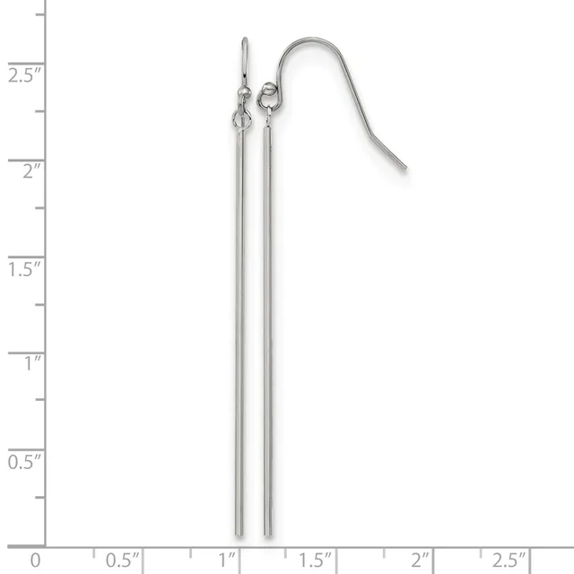 A pair of long silver-toned drop earrings with curved ear wires, displayed against a measurement ruler showing approximately 2.5 inches in length.