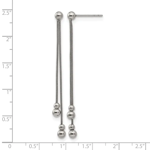 Pair of long dangling earrings with textured chain strands and stacked spherical beads at the bottom, displayed against a ruler showing approximately two inches in length.
