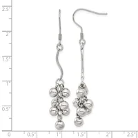 A pair of silver-toned dangle earrings with curved hooks, featuring clustered spherical beads suspended from chain links, displayed against a measurement ruler.