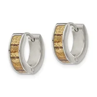 A pair of silver and gold two-tone hinged hoop earrings with textured gold bands inlaid along the outer surface.