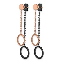 A pair of dangling earrings with rose gold circular studs, each suspending two chains—one rose gold and one black—connected to rose gold and black oval rings.